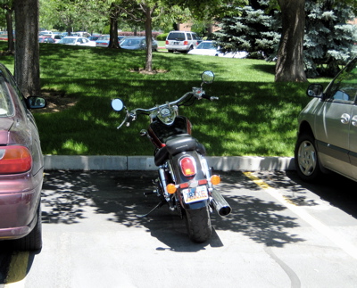 Motorbike takes advantage of inconsiderate parking